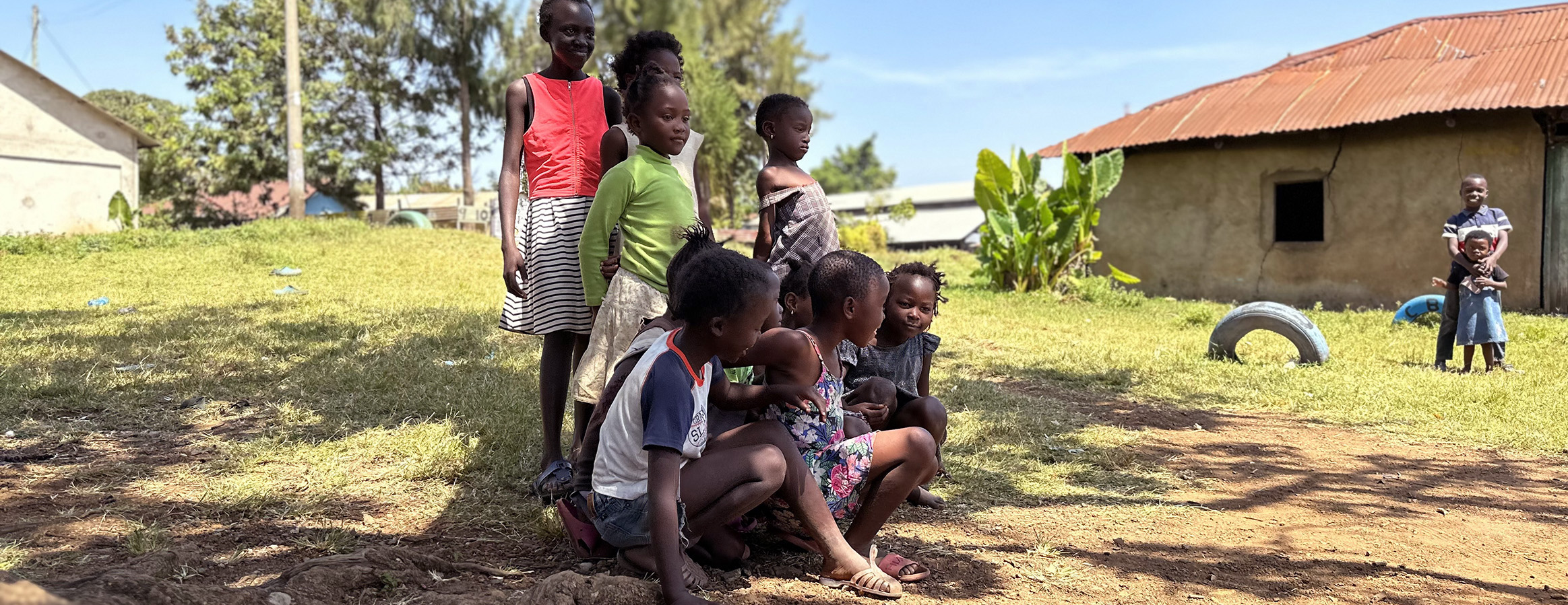 Healthy children posing for a group photo in a rural African community, benefiting from the provision of clean and safe drinking water.