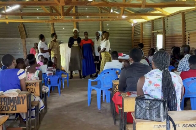 Locals convene for their weekly worship service within a Kodida Primary School building, reflecting the school's pivotal role in the heart of the community.