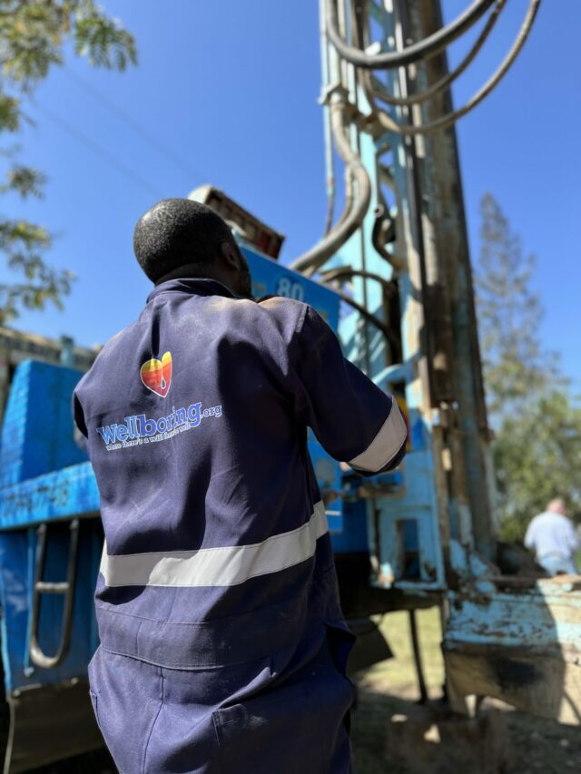 A WellBoring Groundwater technician carefully oversees the alignment of a drilling rig, ensuring the precision necessary for successful well construction.
